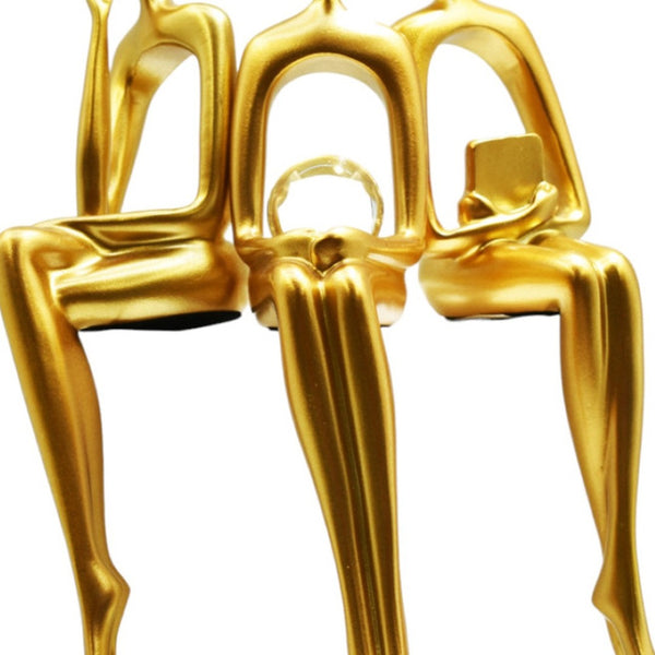 HomeRoots Set of Three Gold Resin People Sculptures - Elegant Tabletop Accents for Modern & Classic Decor 568346