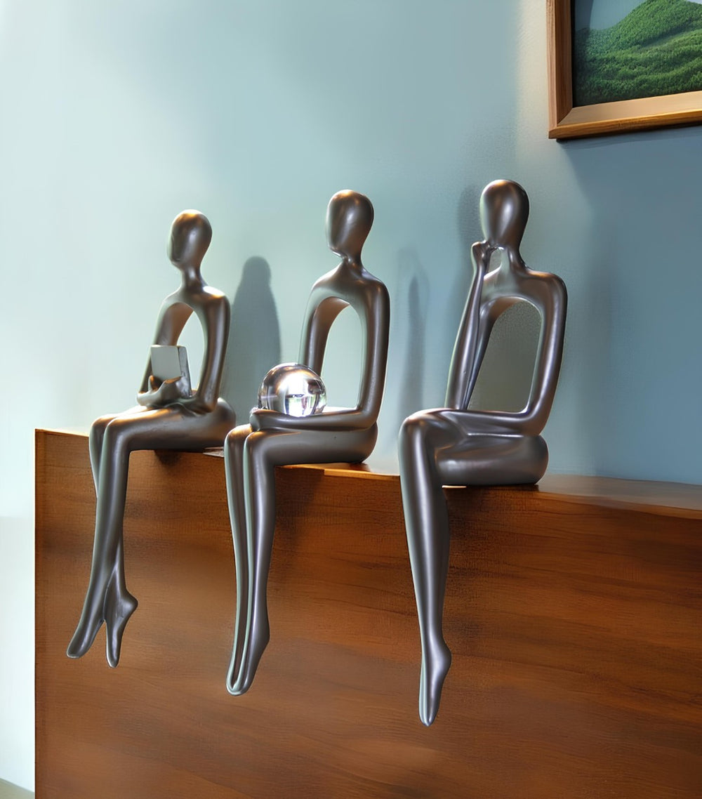 HomeRoots Set of Three Silver Resin People Sculptures - Elegant Modern Art for Home Décor & Gift Ideas 568347