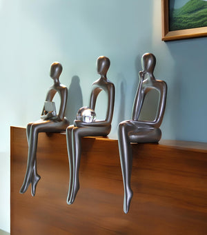 HomeRoots Set of Three Silver Resin People Sculptures - Elegant Modern Art for Home Décor & Gift Ideas 568347