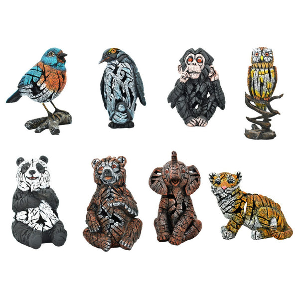 HomeRoots Set of Eight Wilderness-Inspired Resin Animal Sculptures for Elegant Home Decor and Gifting 568354