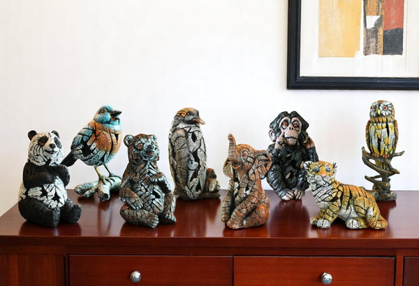 HomeRoots Set of Eight Wilderness-Inspired Resin Animal Sculptures for Elegant Home Decor and Gifting 568354