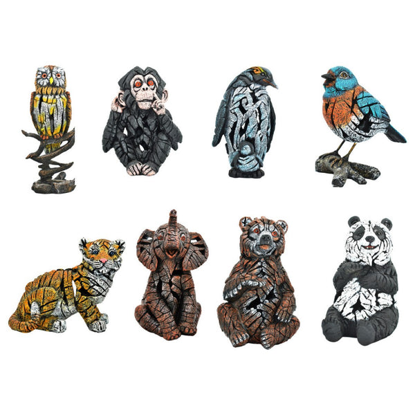 HomeRoots Set of Eight Wilderness-Inspired Resin Animal Sculptures for Elegant Home Decor and Gifting 568354