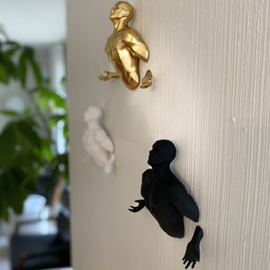 Homeroots Set Of Three Black Gold And White Resin Bursting Men Wall Sculptures - Unique 3d Art Decor  Resin 568397