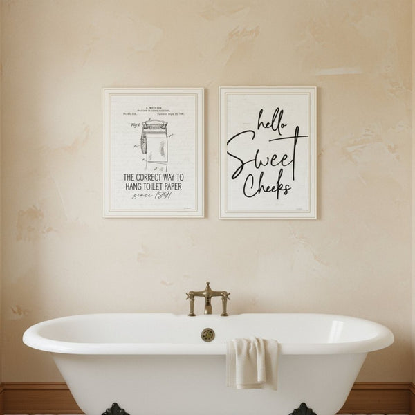 HomeRoots Set of Two Framed Bathroom Wall Art - Whimsical Toilet Paper Hanging Prints for Modern Decor 568649