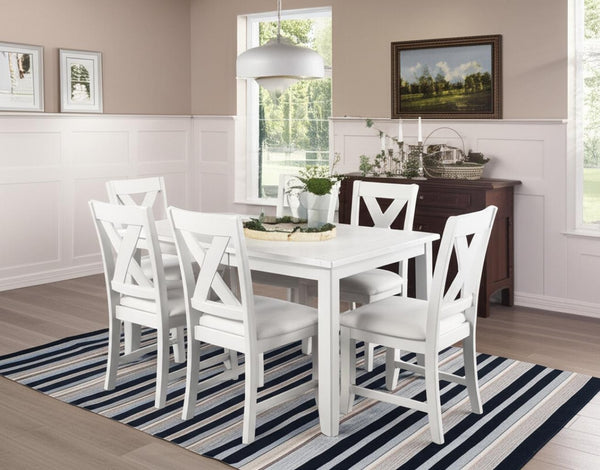 HomeRoots Seven Piece White Wood Dining Set with Six Upholstered Chairs for Modern Everyday Elegance 569339