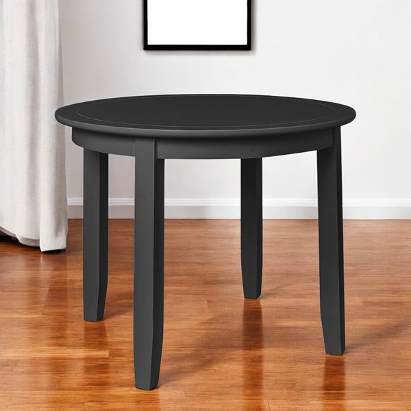 Homeroots 39" Elegant Black Solid Wood Round Dining Table - Perfect For Gatherings, Meals, And Conversations   569344