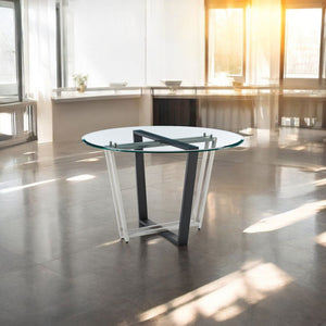 Homeroots 48" Clear And Black Glass And Iron Sled Base Round Top Dining Table   569433