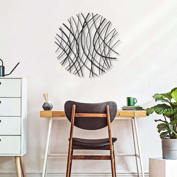 Homeroots 24" Black Metal Circle Abstract Wall Sculpture - Handmade Contemporary Art For Modern Spaces  Metal 569439
