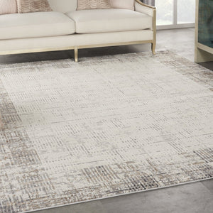 HomeRoots 8' Ivory and Gray Abstract Area Rug - Durable, Stain-Resistant Design for Stylish Living Spaces 8' X 11' 569612