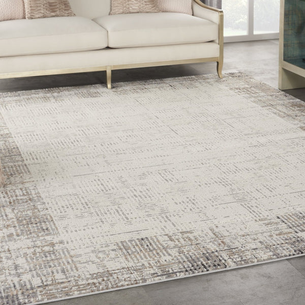 HomeRoots 8' Ivory and Gray Abstract Area Rug - Durable, Stain-Resistant Design for Stylish Living Spaces 8' X 11' 569612