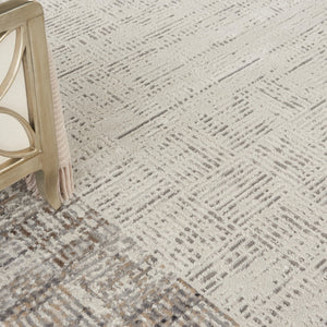 HomeRoots 8' Ivory and Gray Abstract Area Rug - Durable, Stain-Resistant Design for Stylish Living Spaces 8' X 11' 569612