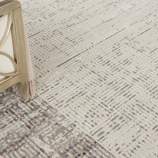 HomeRoots 8' Ivory and Gray Abstract Area Rug - Durable, Stain-Resistant Design for Stylish Living Spaces 8' X 11' 569612