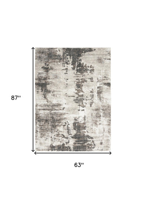 Homeroots 5' X 7' Tan Abstract Power Loom Area Rug  Polypropylene 569618