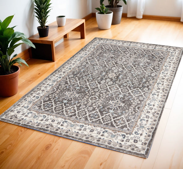 HomeRoots 5' Gray Floral Power Loom Area Rug - Elegant Design for Living Rooms, Bedrooms & Entryways, Durable 4' X 6' 569622