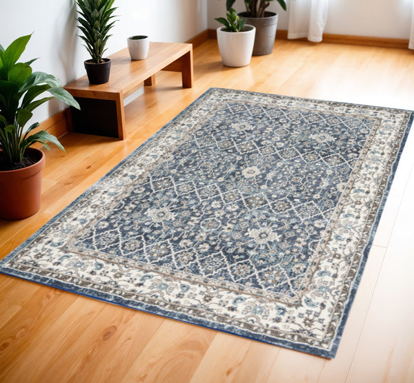 Homeroots 4' X 6' Blue Floral Power Loom Area Rug  Polypropylene 569623