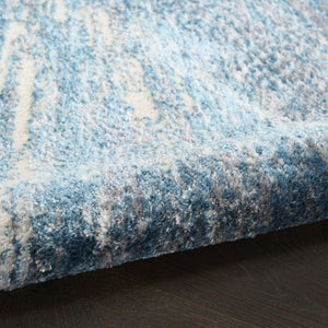HomeRoots 5' Blue Abstract Area Rug - Contemporary Design, Durable Machine-Made, Perfect for Any Room Decor 5' X 7' 569634