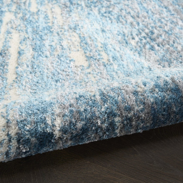 HomeRoots 5' Blue Abstract Area Rug - Contemporary Design, Durable Machine-Made, Perfect for Any Room Decor 5' X 7' 569634