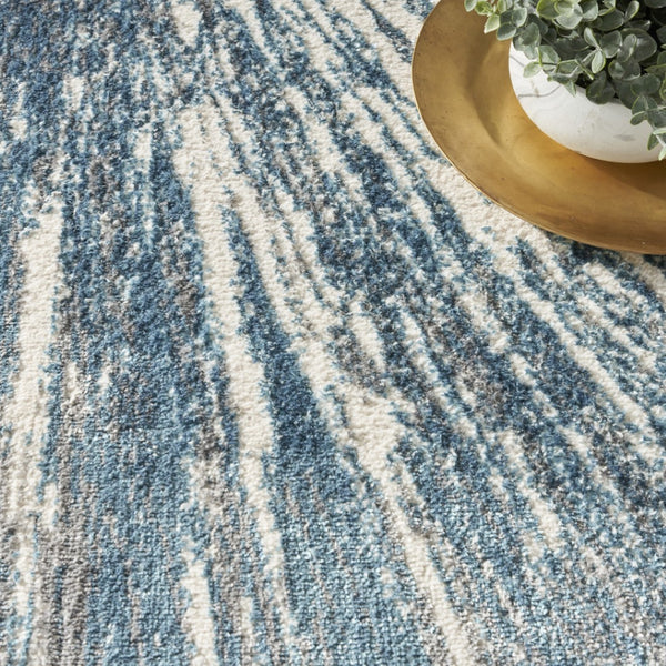 HomeRoots 5' Blue Abstract Area Rug - Contemporary Design, Durable Machine-Made, Perfect for Any Room Decor 5' X 7' 569634