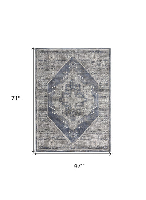 Homeroots 4' X 6' Blue Floral Power Loom Distressed Area Rug  Polypropylene 569648