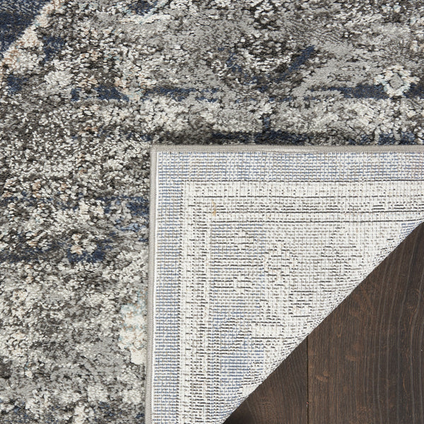 Homeroots 5' X 7' Blue Floral Power Loom Distressed Area Rug  Polypropylene 569652