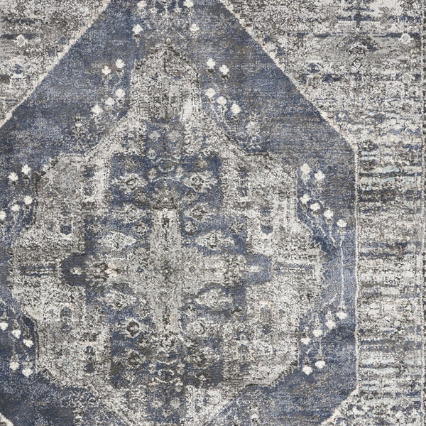 Homeroots 5' X 7' Blue Floral Power Loom Distressed Area Rug  Polypropylene 569652