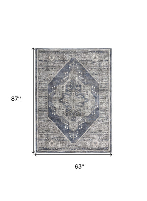 Homeroots 5' X 7' Blue Floral Power Loom Distressed Area Rug  Polypropylene 569652