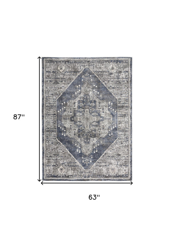 Homeroots 5' X 7' Blue Floral Power Loom Distressed Area Rug  Polypropylene 569652