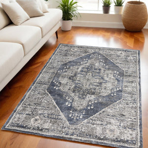 Homeroots 5' X 7' Blue Floral Power Loom Distressed Area Rug  Polypropylene 569652