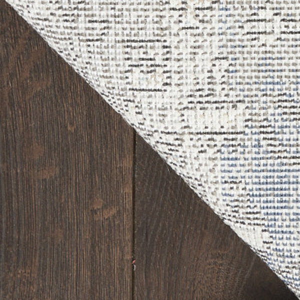 Homeroots 5' X 7' Blue Floral Power Loom Distressed Area Rug  Polypropylene 569652