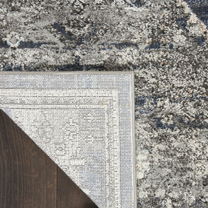 Homeroots 5' X 7' Blue Floral Power Loom Distressed Area Rug  Polypropylene 569652