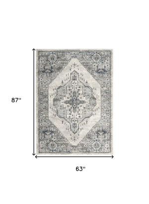 Homeroots 5' X 7' Gray Floral Power Loom Distressed Area Rug  Polypropylene 569654