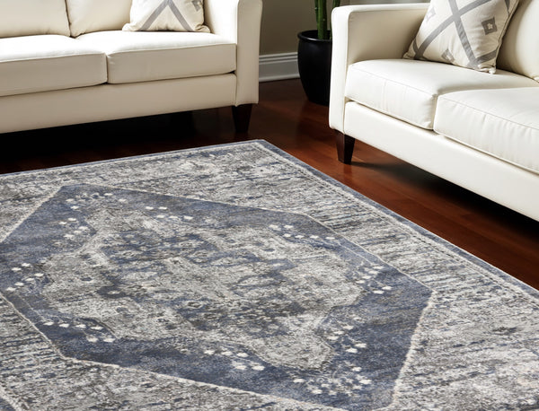 Homeroots 8' X 10' Blue Floral Power Loom Distressed Area Rug  Polypropylene 569656