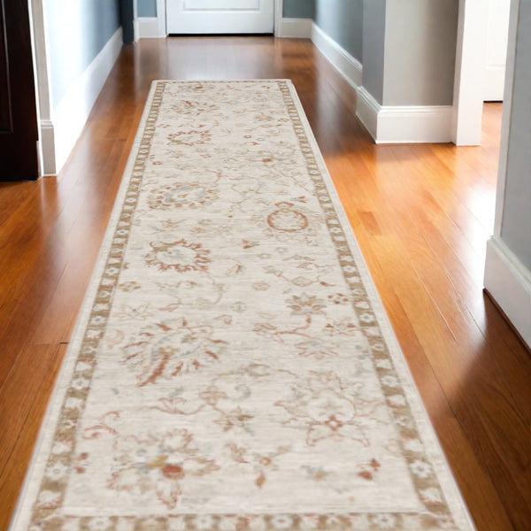 Homeroots 10' Ivory Floral Power Loom Distressed Runner Rug  Polyester 569661