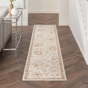 HomeRoots 8' Cream Floral Power Loomed Area Rug with Distressed Finish and Timeless Fringe for Any Room 10' Runner 569661