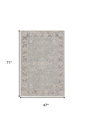 Homeroots 4' X 6' Blue Floral Power Loom Distressed Area Rug  Polyester 569664