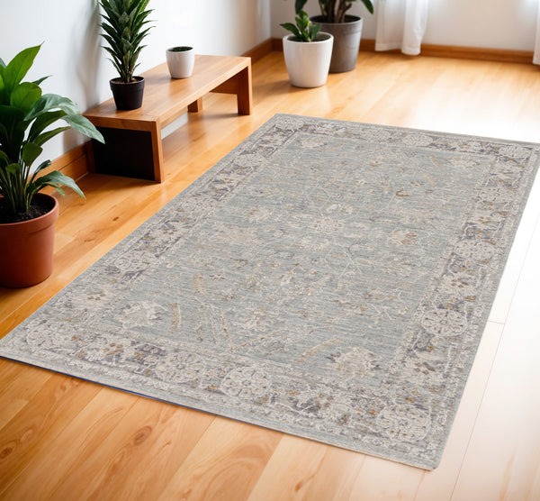 Homeroots 4' X 6' Blue Floral Power Loom Distressed Area Rug  Polyester 569664