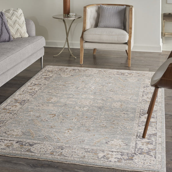 HomeRoots 10' Blue Floral Power Loom Distressed Rug - Vintage Charm for Hallways with Durable, Easy-Care Design 4' X 6' 569664