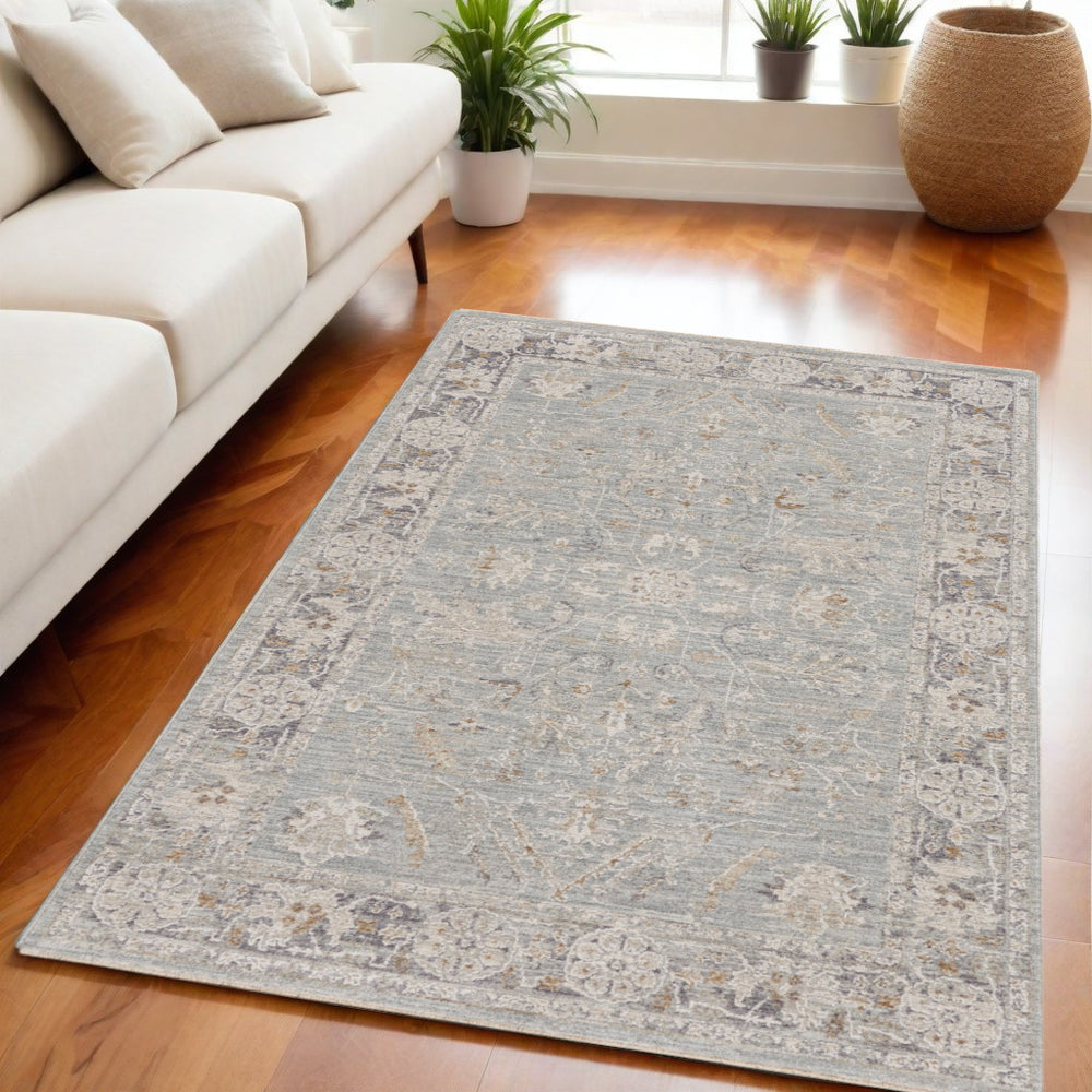 Homeroots 5' X 8' Blue Floral Power Loom Distressed Area Rug  Polyester 569668
