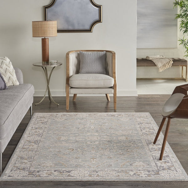 HomeRoots 10' Blue Floral Power Loom Distressed Rug - Vintage Charm for Hallways with Durable, Easy-Care Design 5' X 8' 569668