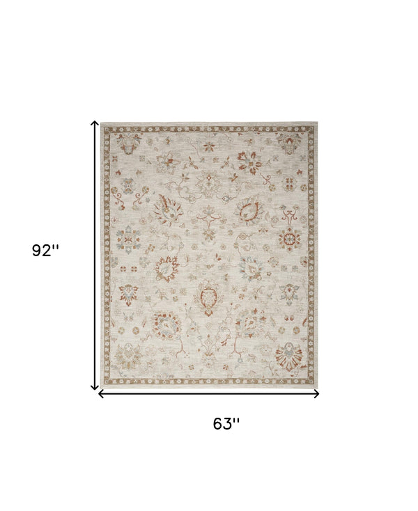 Homeroots 5' X 8' Ivory Floral Power Loom Distressed Area Rug  Polyester 569669