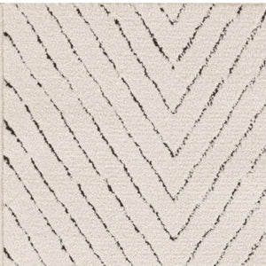 Homeroots 10' Ivory And Black Geometric Runner Rug - Stylish, Durable, Stain-resistant Accent For Any Space  Polyester 569815