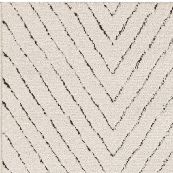 Homeroots 10' Ivory And Black Geometric Runner Rug - Stylish, Durable, Stain-resistant Accent For Any Space  Polyester 569815