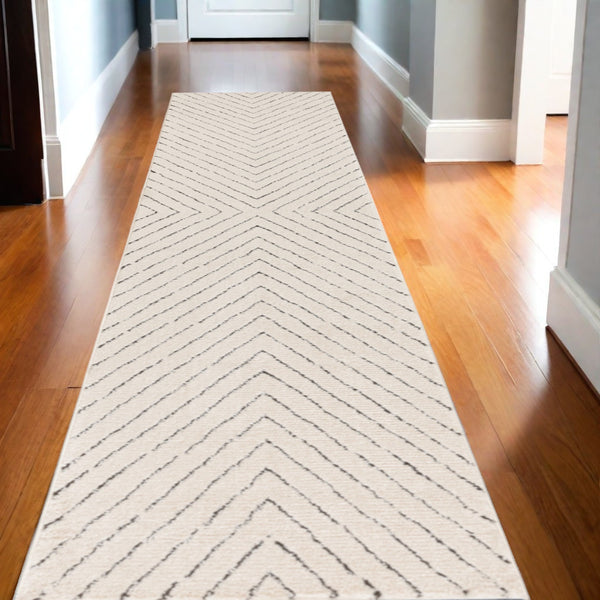 Homeroots 10' Ivory And Black Geometric Runner Rug - Stylish, Durable, Stain-resistant Accent For Any Space  Polyester 569815
