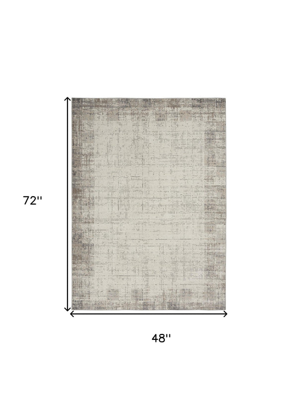 Homeroots 4' X 6' Ivory And Gray Abstract Area Rug  Polypropylene 569824