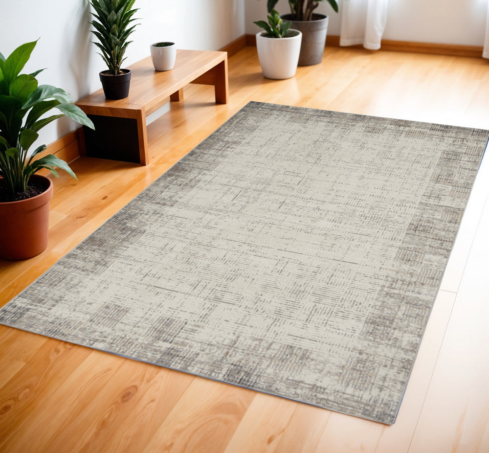 Homeroots 4' X 6' Ivory And Gray Abstract Area Rug  Polypropylene 569824