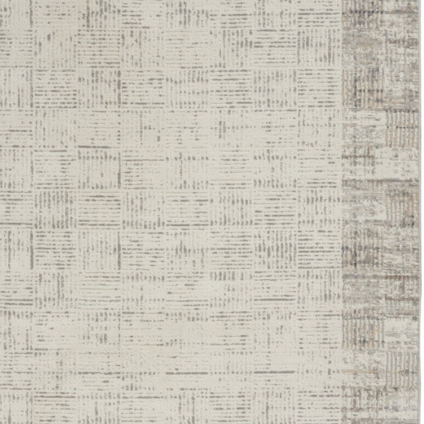 Homeroots 5' X 7' Ivory And Gray Abstract Area Rug  Polypropylene 569825