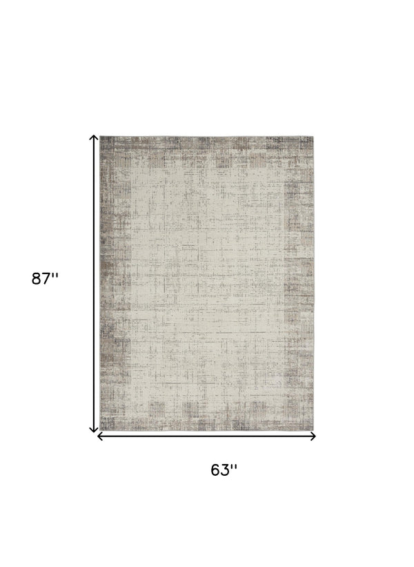 Homeroots 5' X 7' Ivory And Gray Abstract Area Rug  Polypropylene 569825