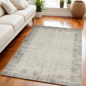 Homeroots 5' X 7' Ivory And Gray Abstract Area Rug  Polypropylene 569825