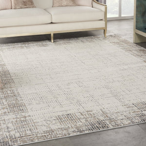 HomeRoots 8' Ivory and Gray Abstract Area Rug - Stylish, Durable, Stain-Resistant Design for Modern Spaces 9' X 12' 569827