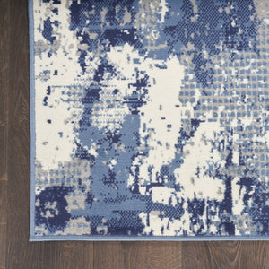HomeRoots 9' Modern Blue Abstract Area Rug – Power Loomed for Durability and Style in Any Living Space 9' X 12' 569869